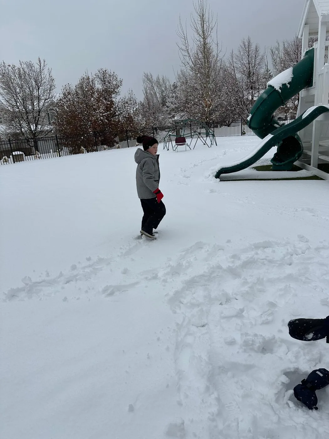 Student enjoying outdoor snow play