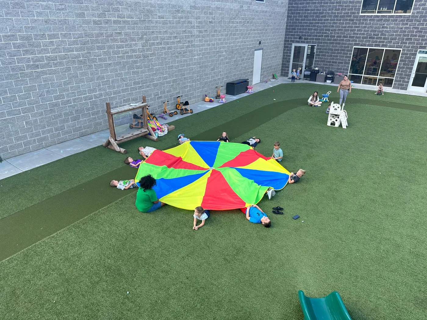Students enjoying outdoor group play at Providence Montessori Academy